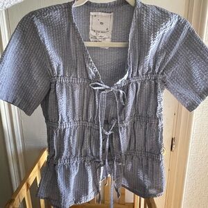 Blue Short Sleeve Textured Women's Top with 3 adjustable ties in the front